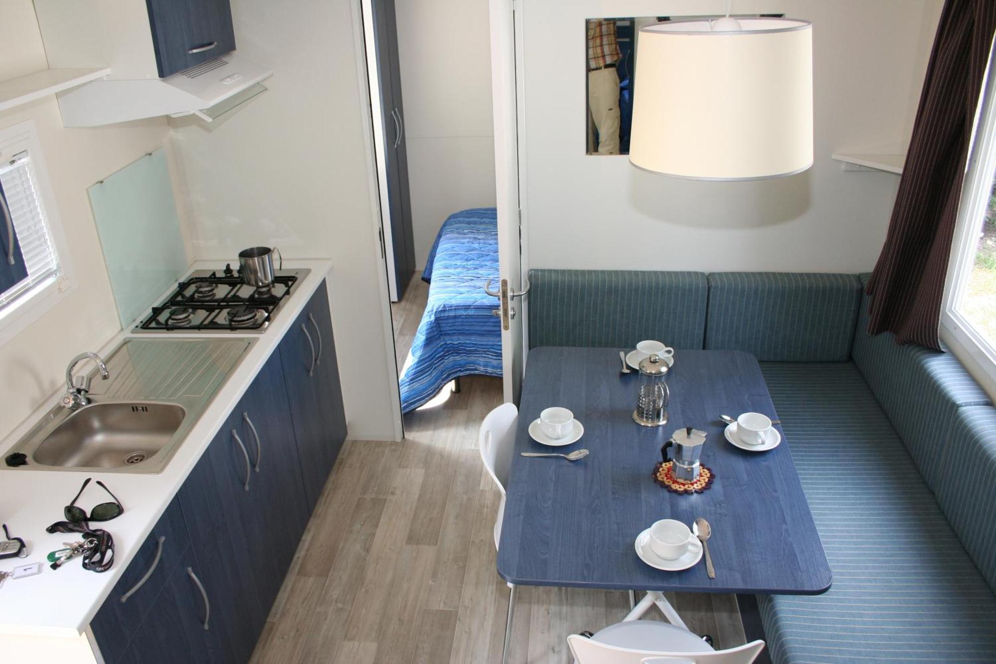 Happy Camp Mobile Homes In Camping Villaggio Internazionale San Menaio Bagian luar foto
